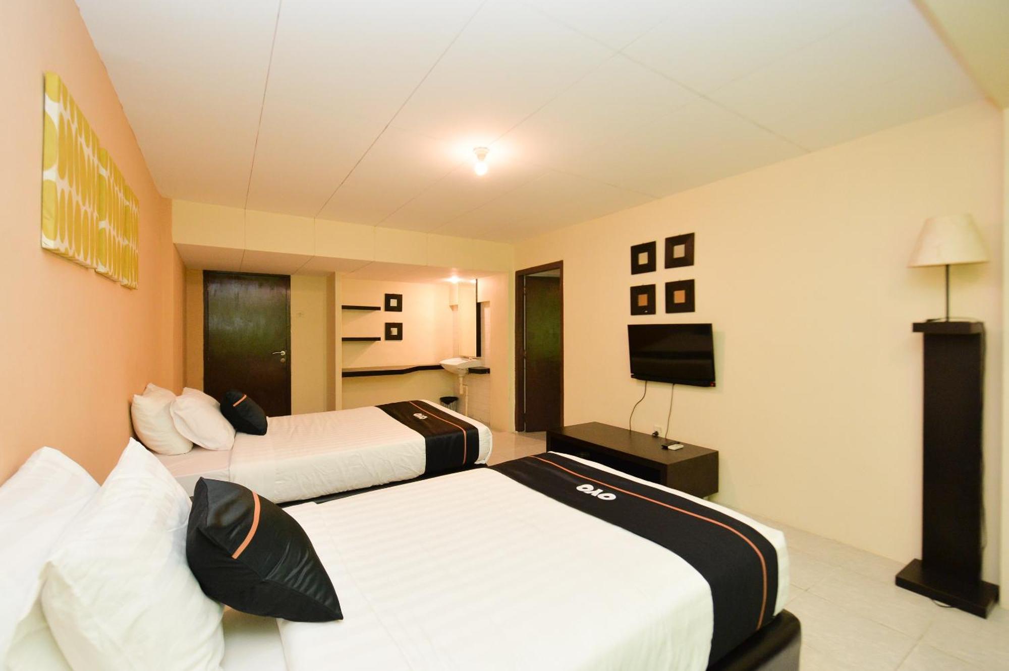 Oyo 2487 Sampurna Jaya Hotel Танджунгпинанг Экстерьер фото